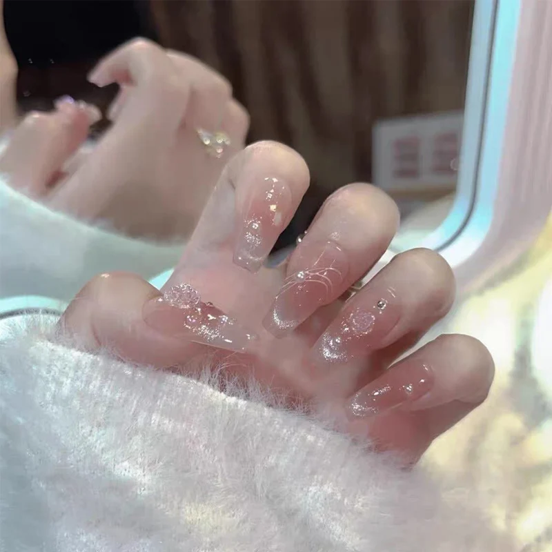 Künstlerisches Press-On-Nagelset mit glitzernden Sternakzenten Karnz