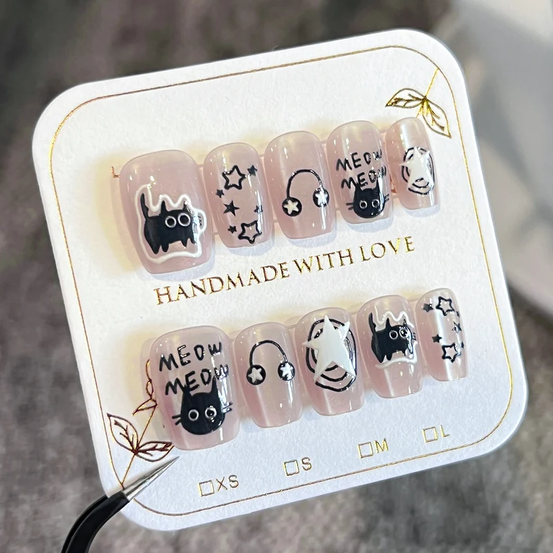 Artificial nail art with cat designs Stornfield