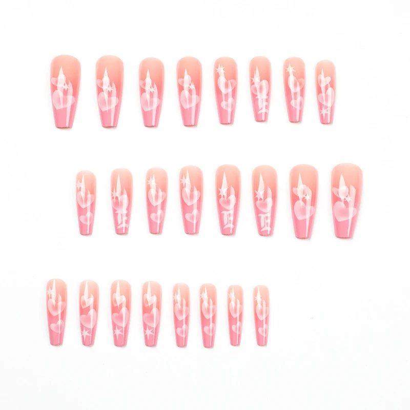 Artificial nail art with heart patterns Stornfield