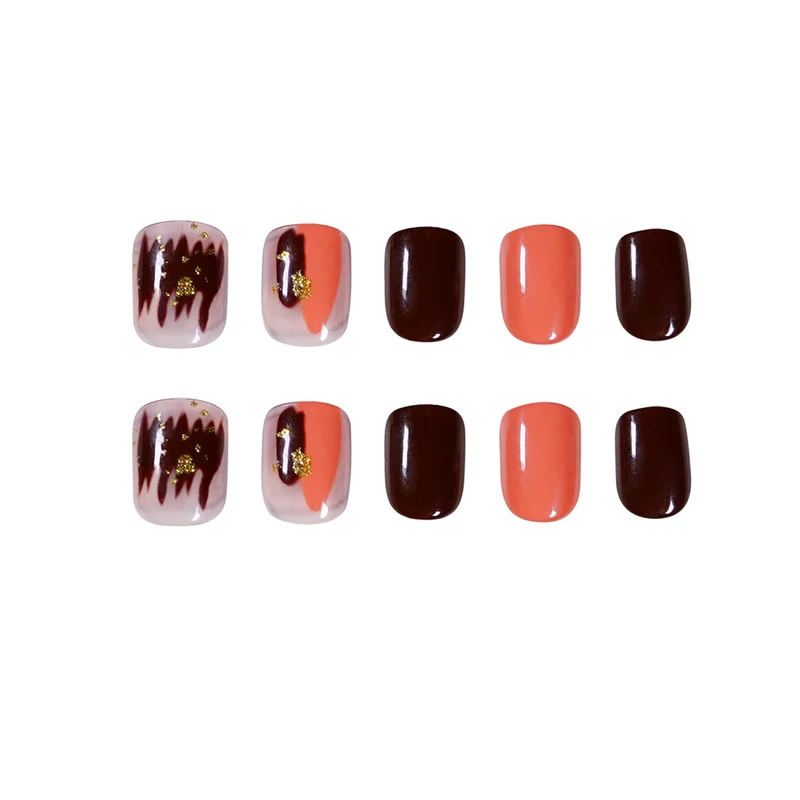 Artificial Nail Art with Gold Decorations Stornfield