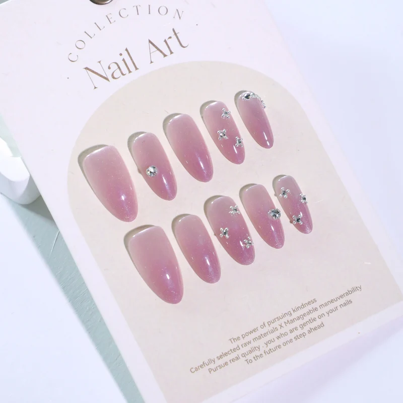 Artificial nail art with glitter embellishments Stornfield