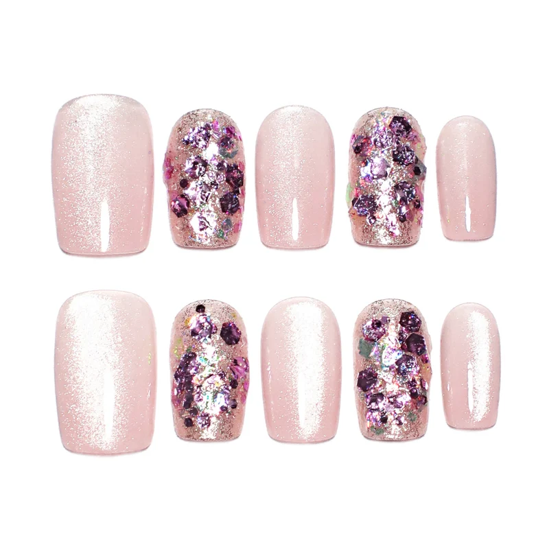 Artificial nail art with glitter and glamour effects Stornfield