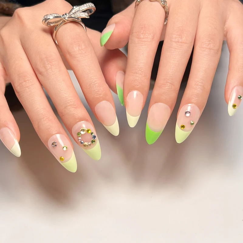 Artificial nail art with spring-like design and sparkling accents Stornfield