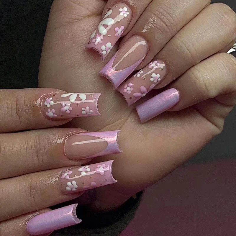 Artificial nail art with floral patterns and shine Stornfield