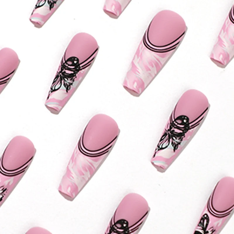 Artificial nail art with delicate butterfly designs Stornfield