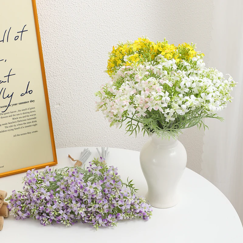 Decorative artificial flower arrangement
