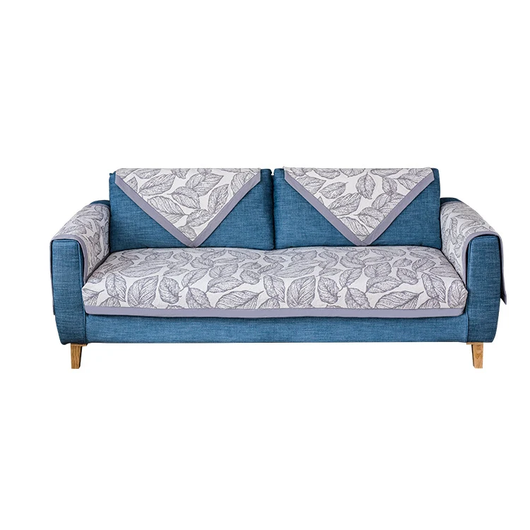 Universelle Sofa-Schutzauflage für Dreisitzer mit Blätter-Print, rutschfester Unterseite und separaten Armlehnenbezügen Karnz