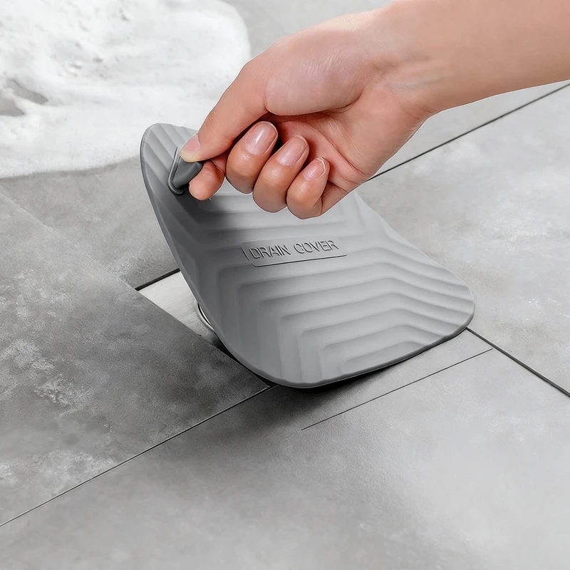 Silicone floor drain seal, odor-reducing