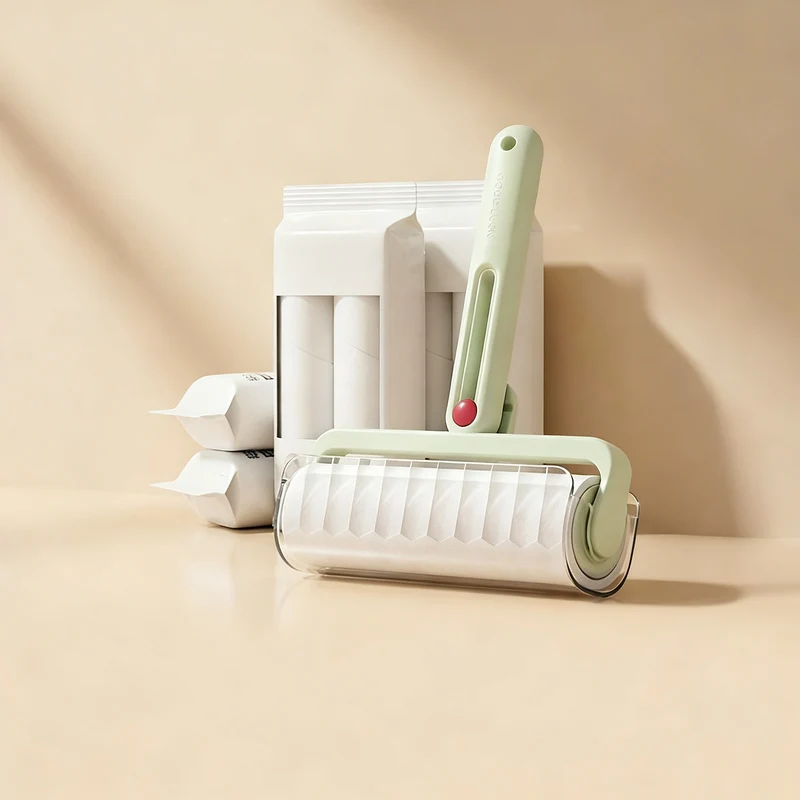 Lint roller with replacement rolls, foldable
