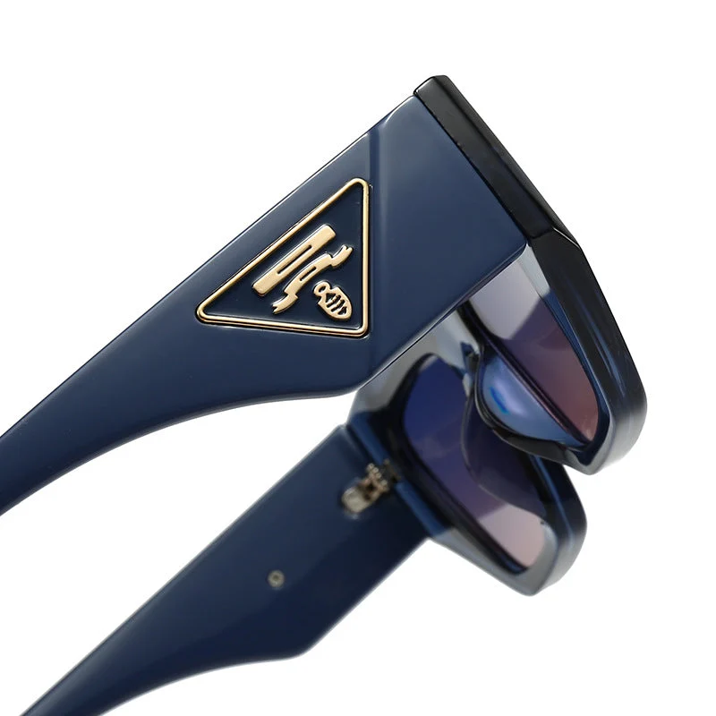 Dame Designer solbrille med moderne, geometrisk ramme Luvikno