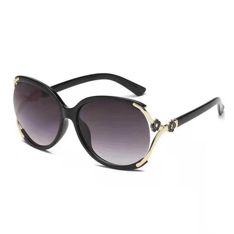 Dame elegante oversized solbrille med gyldne aksenter Luvikno