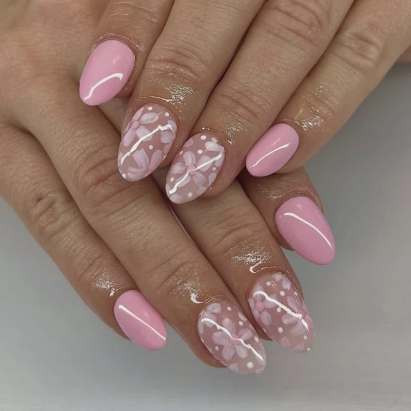 Künstliche Nagelkunst mit verspielten Punkten und Schleifen Karnz