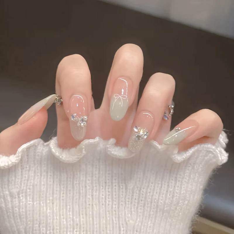 Elegant Gel Press-On Nails with Rhinestone and Glitter Accents Stornfield