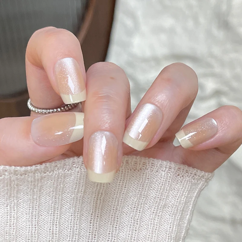 Elegant French Tip Press-On Nails with Shimmer Effect Stornfield