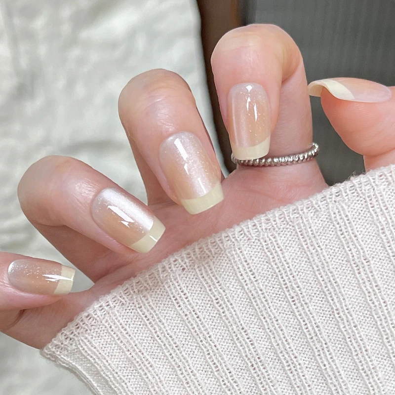 Elegant French Tip Press-On Nails with Shimmer Effect Stornfield