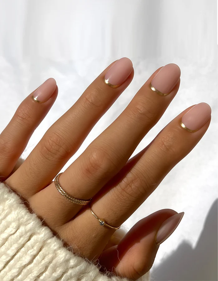 Elegant French Tip Press-On Nails with Metallic Accents Stornfield