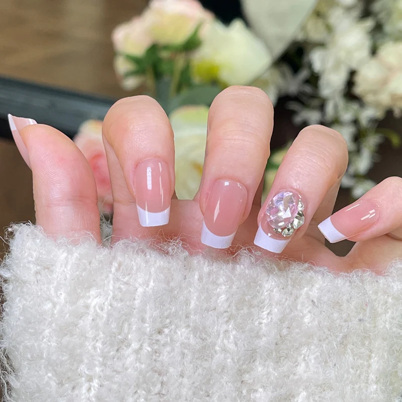Elegant French Tip Press-On Nails with Decorative Rhinestone Accent Stornfield