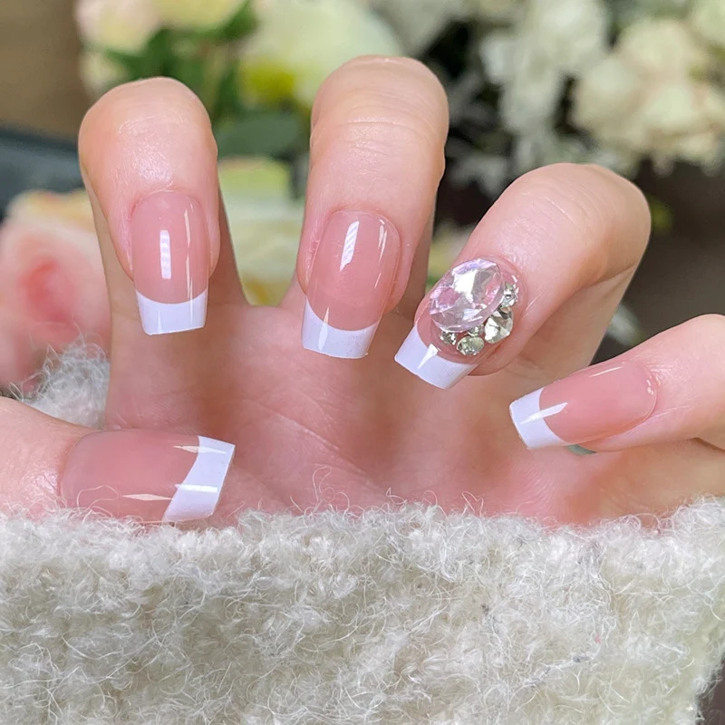 Elegant French Tip Press-On Nails with Decorative Rhinestone Accent Stornfield