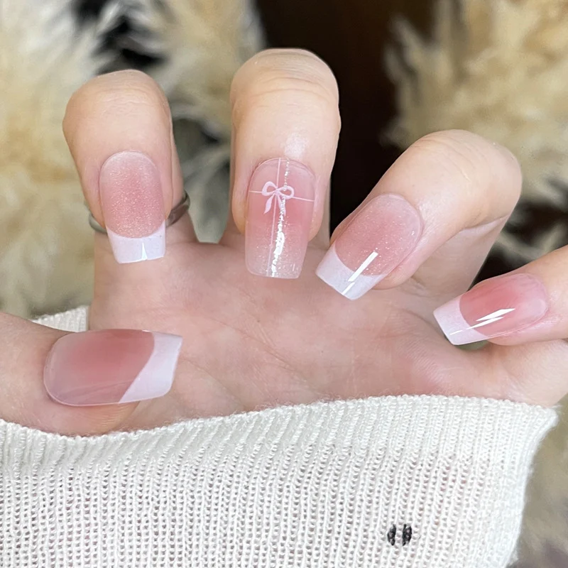 Elegant French Tip Press-On Nails with Bow Design Stornfield