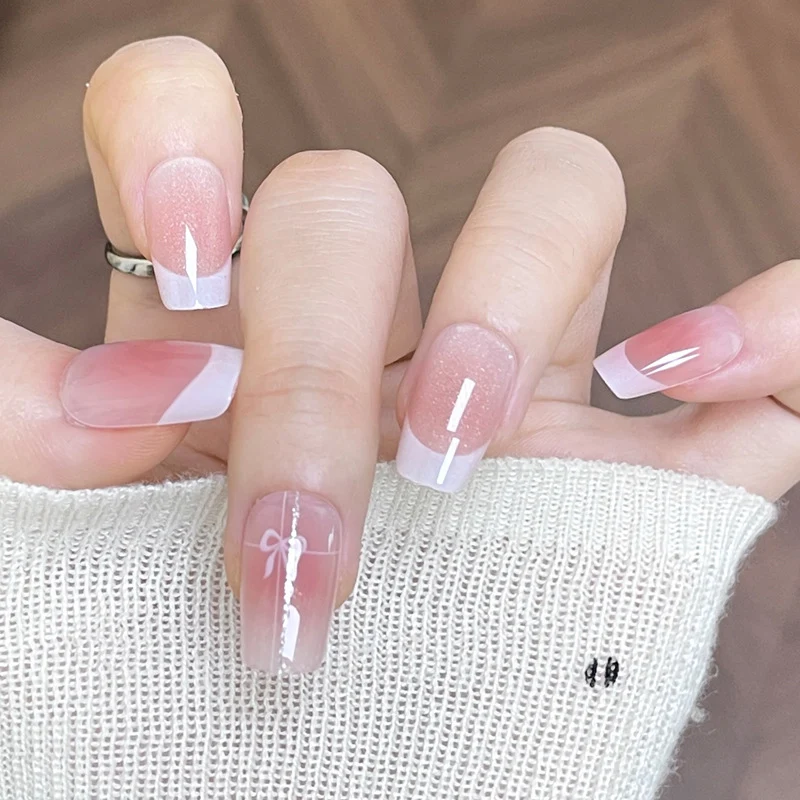 Elegant French Tip Press-On Nails with Bow Design Stornfield