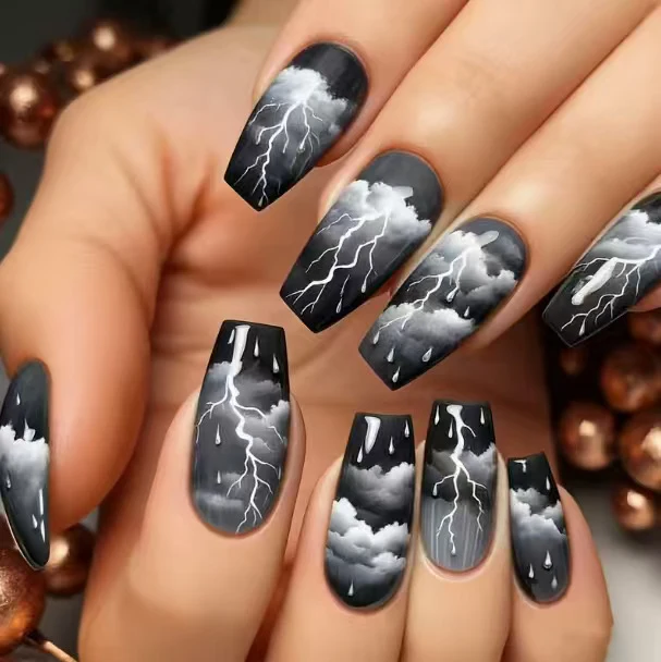 Artistic Lightning-Themed Nail Art Extensions Stornfield