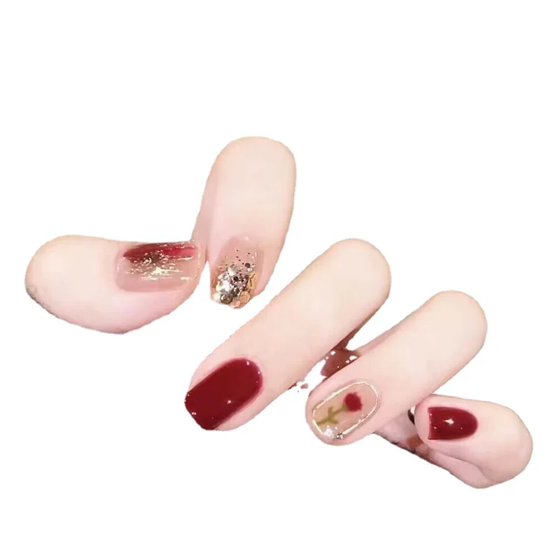Decorative Press-On Nail Art Set with Glitter and Floral Accents Stornfield