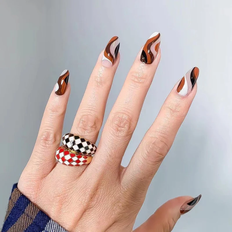 Artfully decorated nail extensions Stornfield