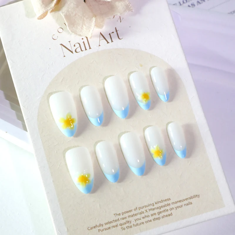 Artfully designed nail extensions with floral accent Stornfield