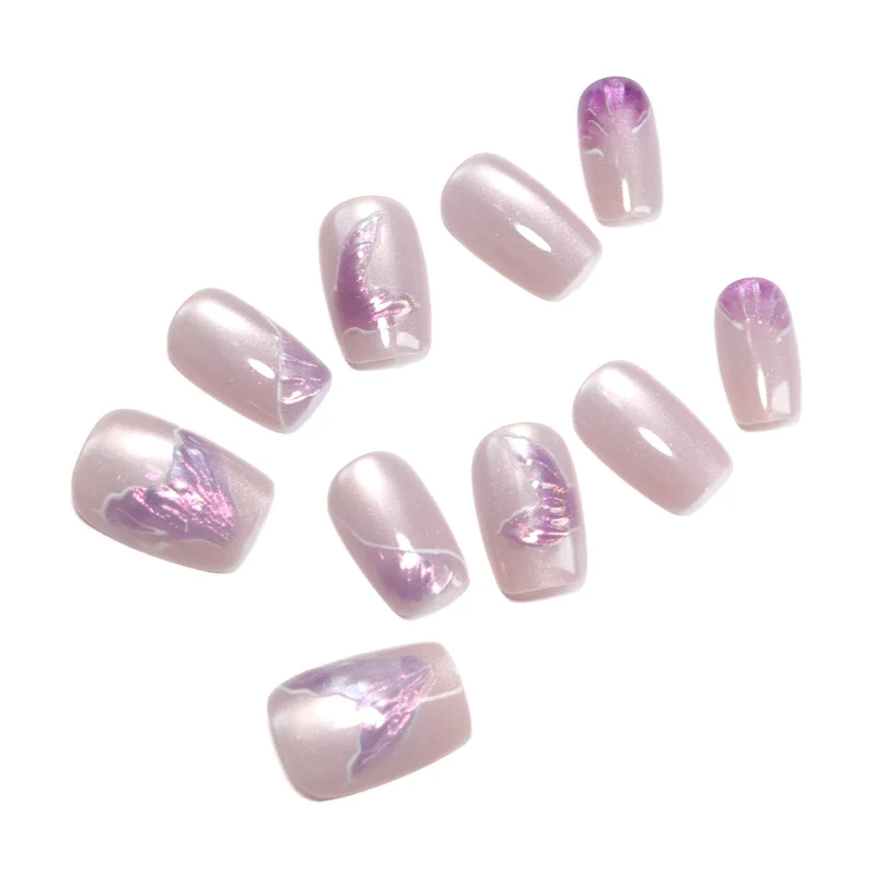 Artfully designed nail extensions with elegant flower motifs Stornfield