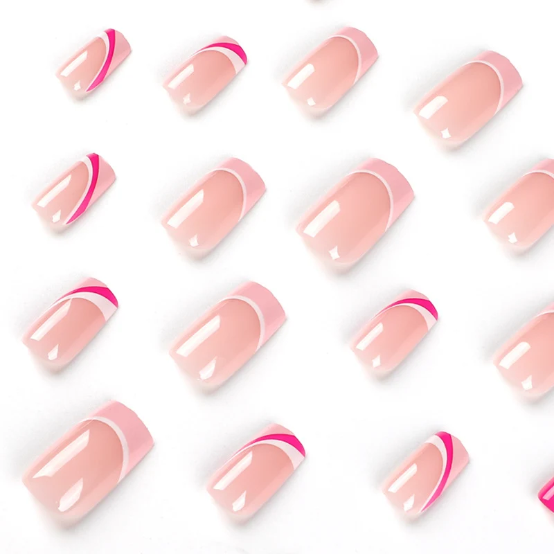 Acrylic nail extensions with elegant gradient and curved accents Stornfield