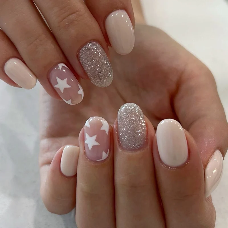 Acrylic nails with star and glitter pattern Stornfield