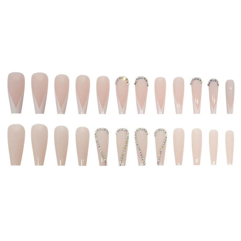 Stylish Press-On Nail Design with Elegant Rhinestone Accents Stornfield