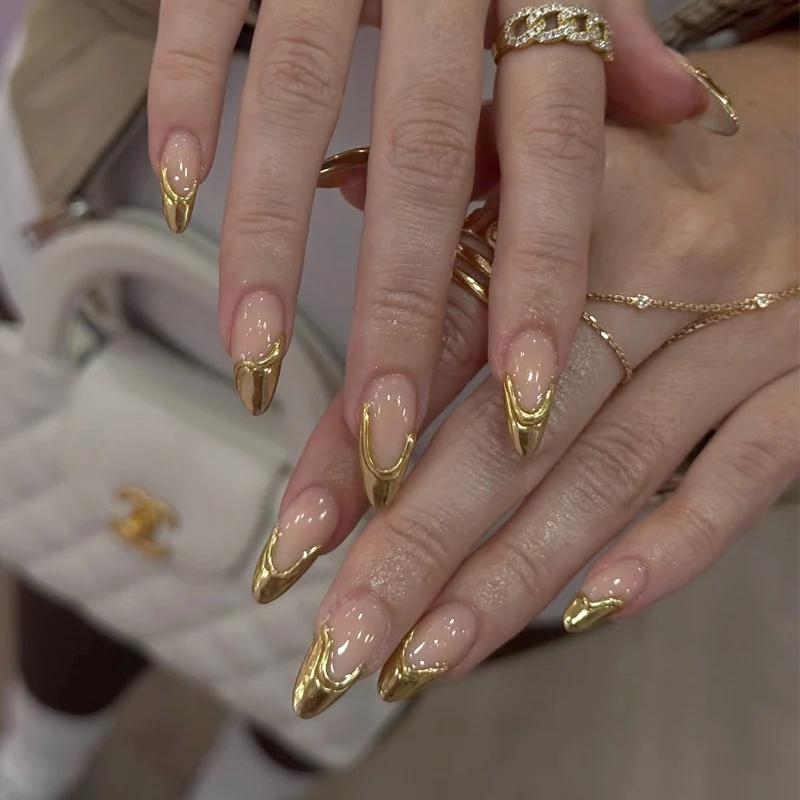 Stiletto Nail Enhancements with Gold Accents Stornfield