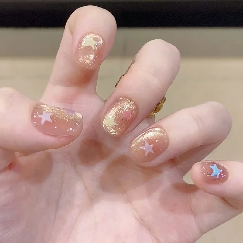 Star-Themed Glittery Nail Art Stornfield