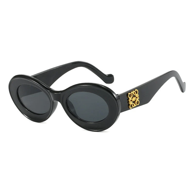 Dame fashionable solbriller med oval ramme og gullakenter Luvikno