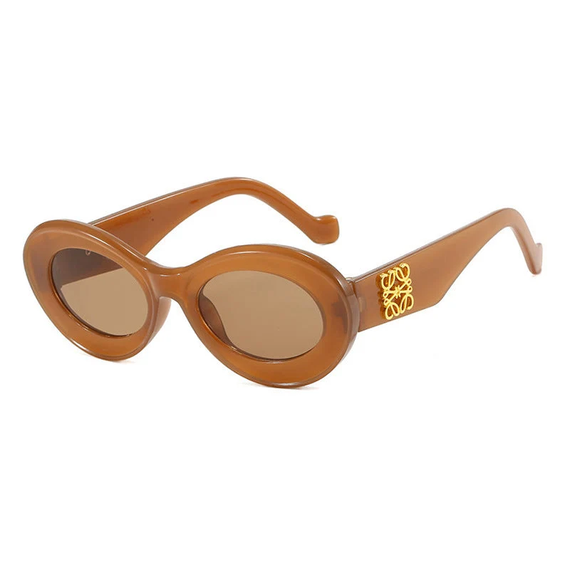 Dame fashionable solbriller med oval ramme og gullakenter Luvikno