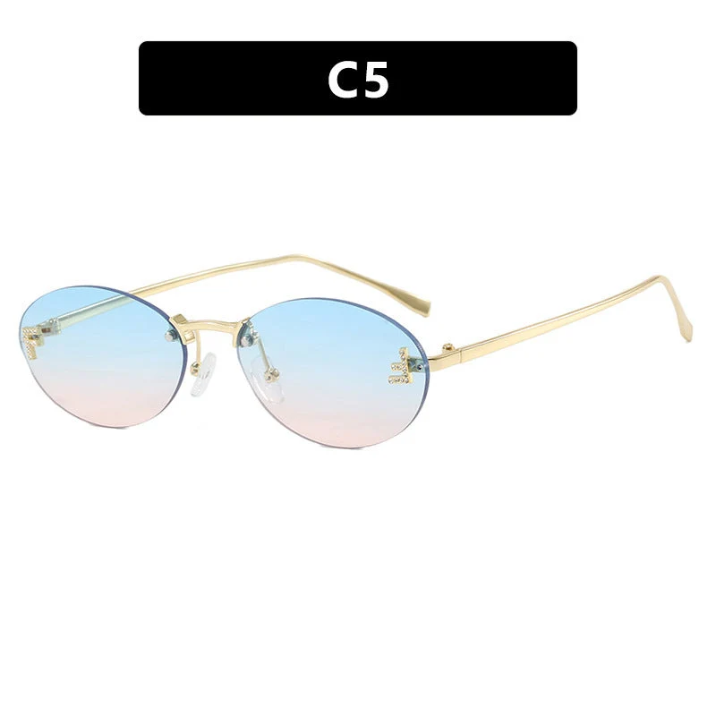 Dame mote trendy solbriller med elegante, runde glass og filigran metallramme Luvikno
