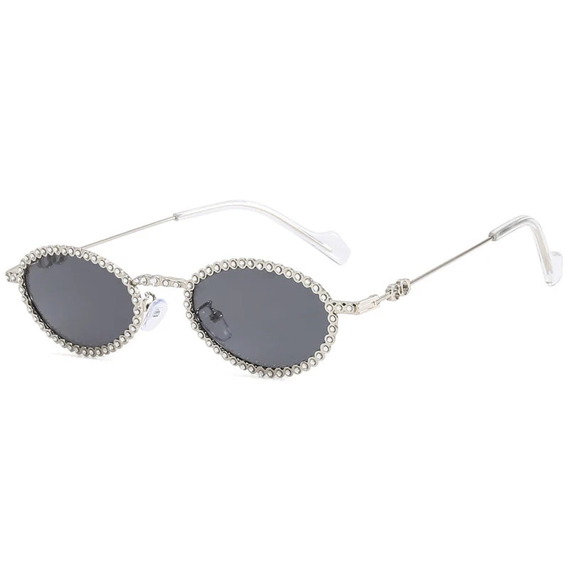 Dame moteriktig solbrille med unik, lekende kant Luvikno