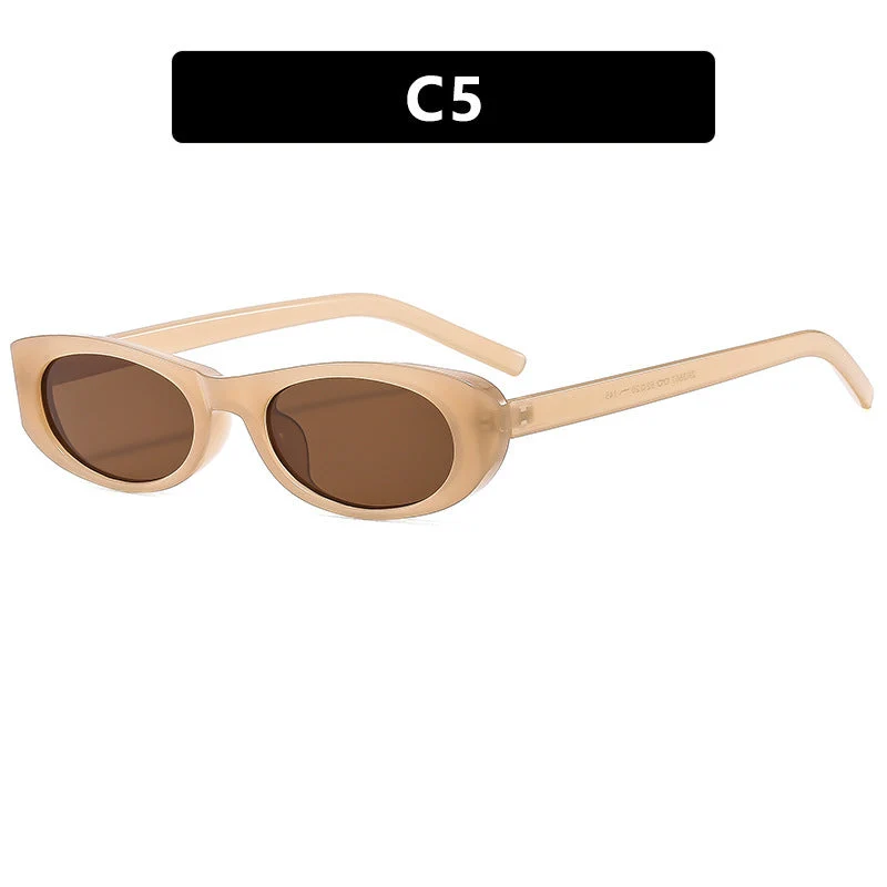 Dame moteriktig solbrille i elegant oval ramme Luvikno