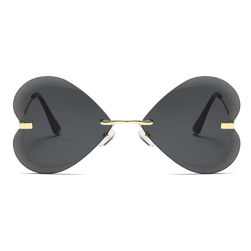 Kvinnelige hjerteformede solbriller i trendy design Luvikno