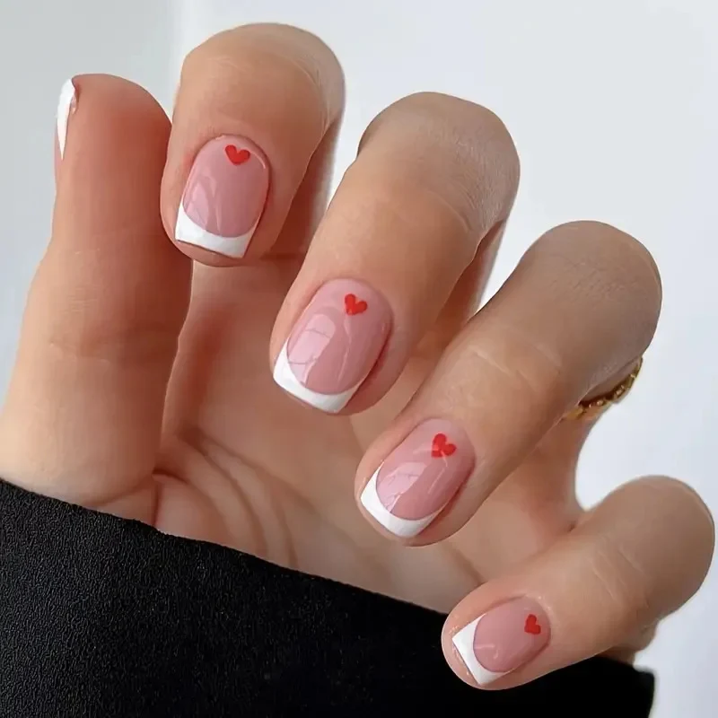 Heart-Embellished Nail Art Design Stornfield