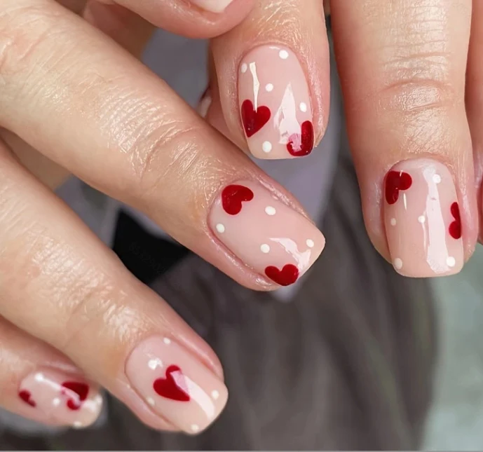 Heart-Embellished Nail Art Design Stornfield