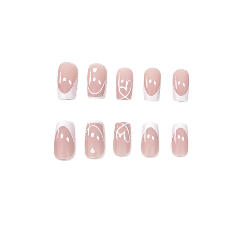 Heart-Embellished French Tip Nail Art Stornfield