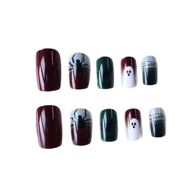Halloween-Themed Spider and Ghost Nail Art Stornfield