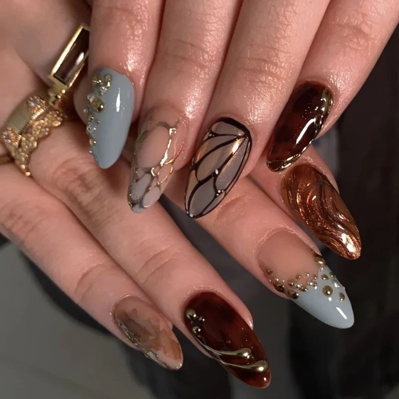 Artful Nail Art with Glitter and Accents Stornfield