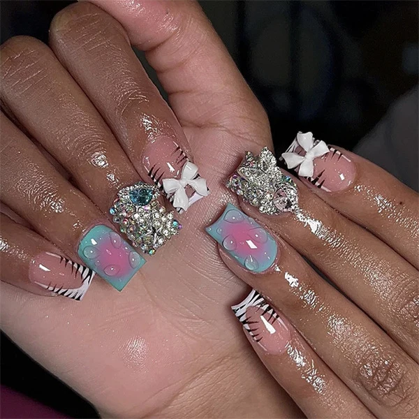 Artistic Nail Art with Glitter and 3D Details Stornfield