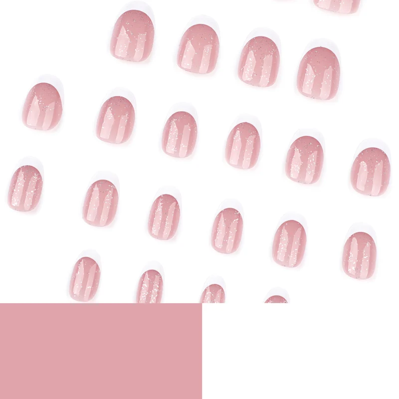 Artful nail art with glitter in gentle tones and elegant tips Stornfield