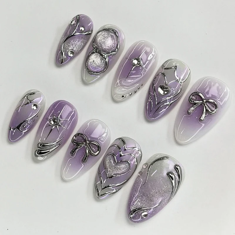 Artful Nail Art with Shiny Accents and Delicate Lilac Stornfield