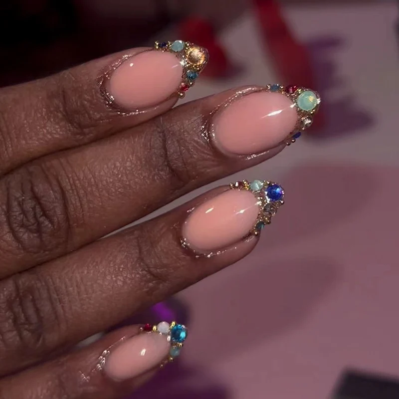 Artful nail art with glamorous rhinestone embellishments Stornfield