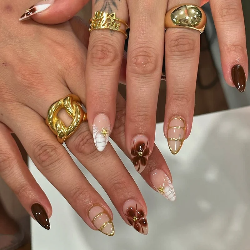 Artful nail art with glamorous accents and elegant embellishments Stornfield